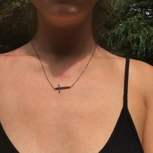 Sideways cross necklace